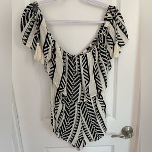VICI off-the-shoulder tassel romper. Fits like XS